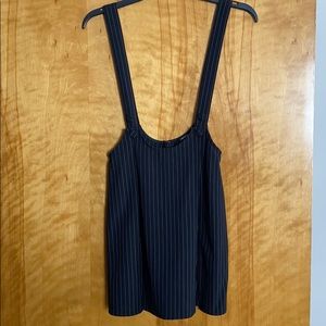 Black skirt with attached suspenders